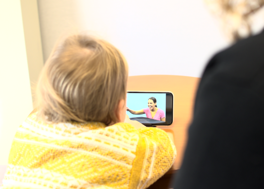 Child views video on ipad