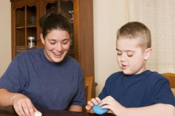 Mom and son playing with play dough