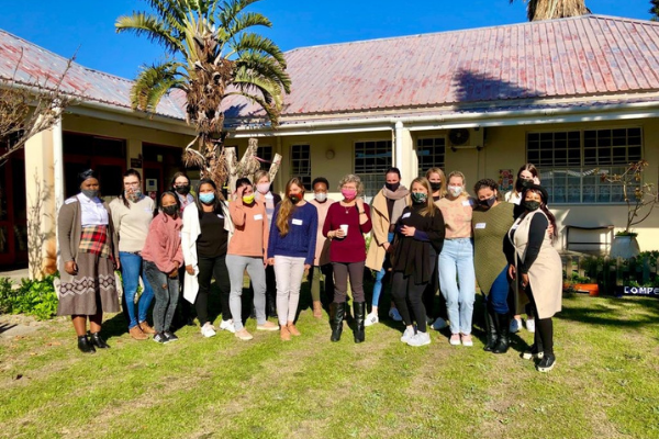 Group of adults who participated in training together. Outside center in south africa