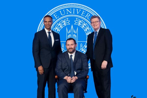 Gary Maslow (seated at center) with Duke President Vincent Price