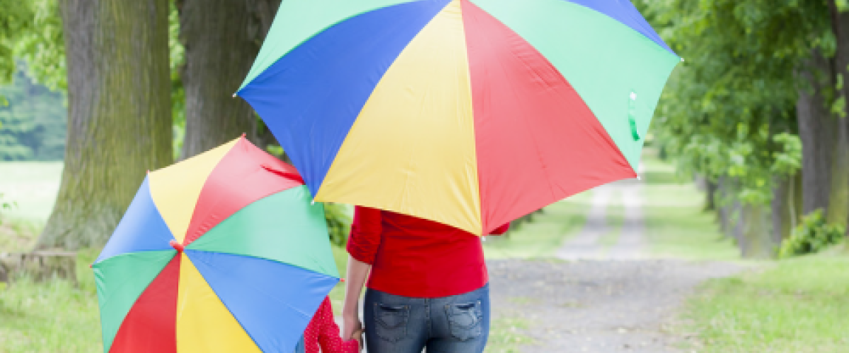 People walking with umbrellas