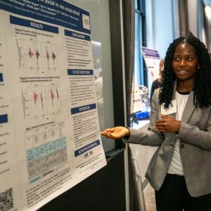 Ashleigh Waterman displays a research poster